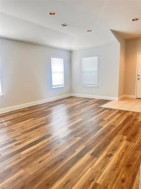 12262 PEAK Circle, Frisco, TX 75035 Empty room with light wood-type flooring and recessed lighting