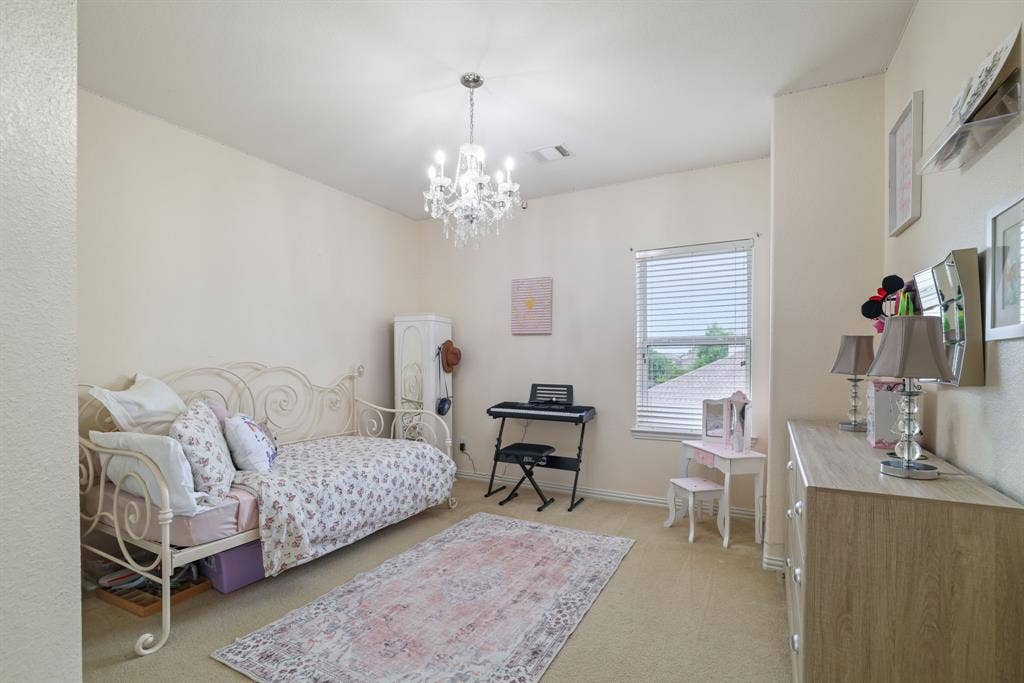 1213 Egret Court, Little Elm, TX 75068 Recessed lighting, chandelier, window with blinds, and neutral-toned carpeting