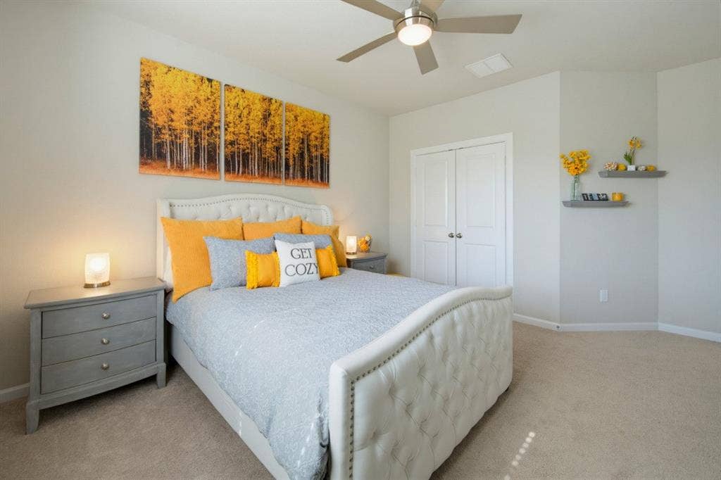 2721 Old Shire Path Road, Prosper, TX 75078 Ceiling fan with integrated lighting, wall-to-wall carpeting, double closet doors, and built-in shelving