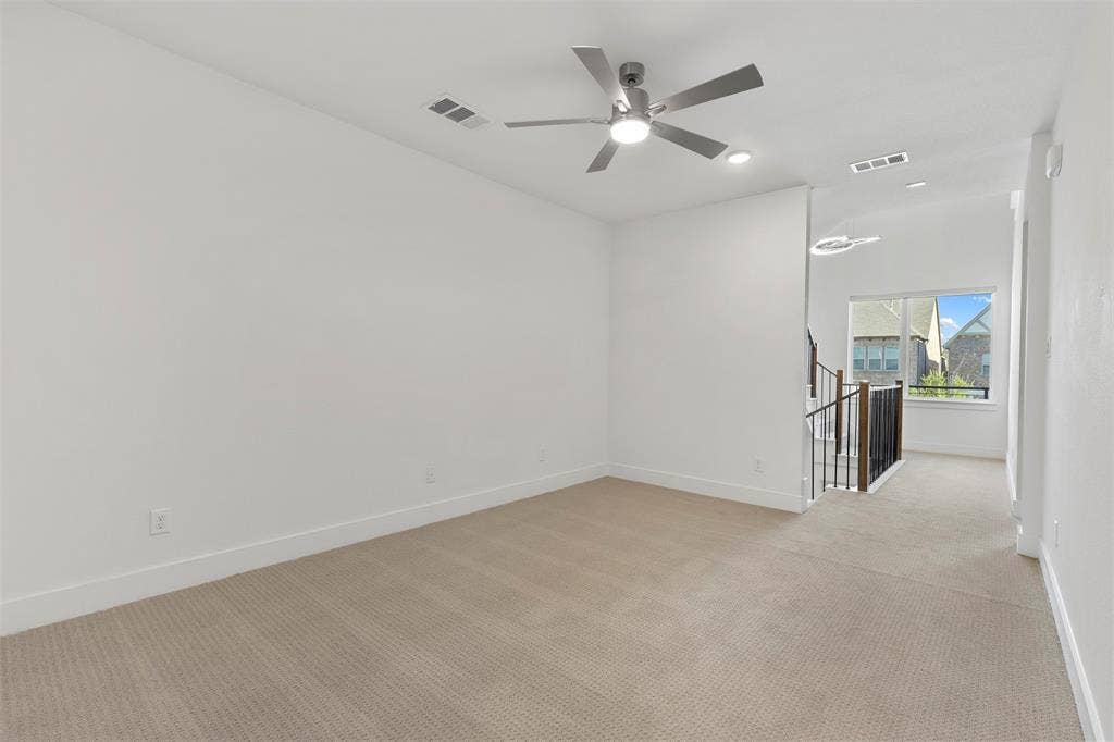 This expansive and versatile bonus room offers endless possibilities, featuring ample natural light, high-quality finishes, and plenty of space to serve as a media room, play area, or secondary living space.