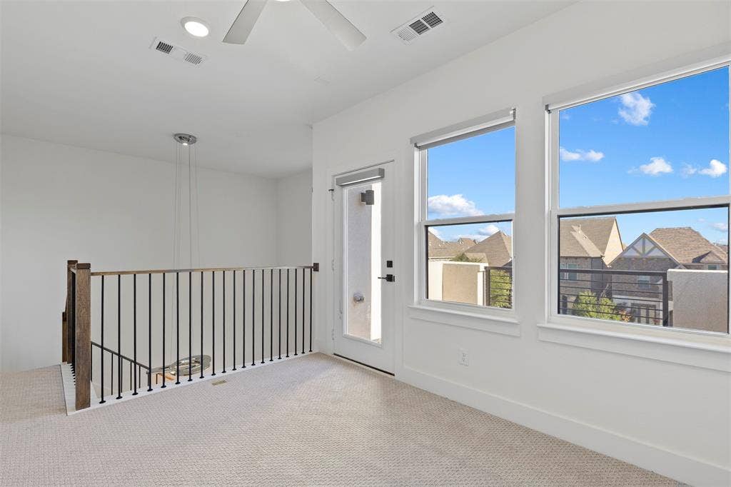 This versatile bonus living area located on the third floor offers an ideal layout that could easily serve as a quiet, productive home office, a vibrant game room, or a private hobby space to suit your specific lifestyle needs.