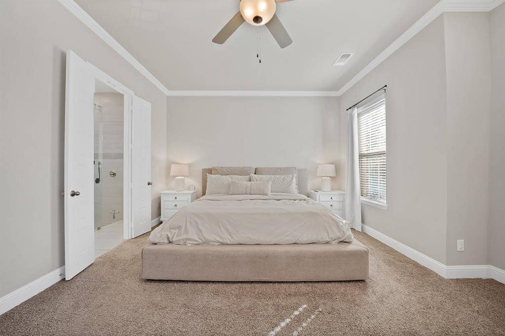 1837 Averi Lane, Farmers Branch, TX 75234 Neutral wall tones, crown molding, and a ceiling fan with integrated lighting