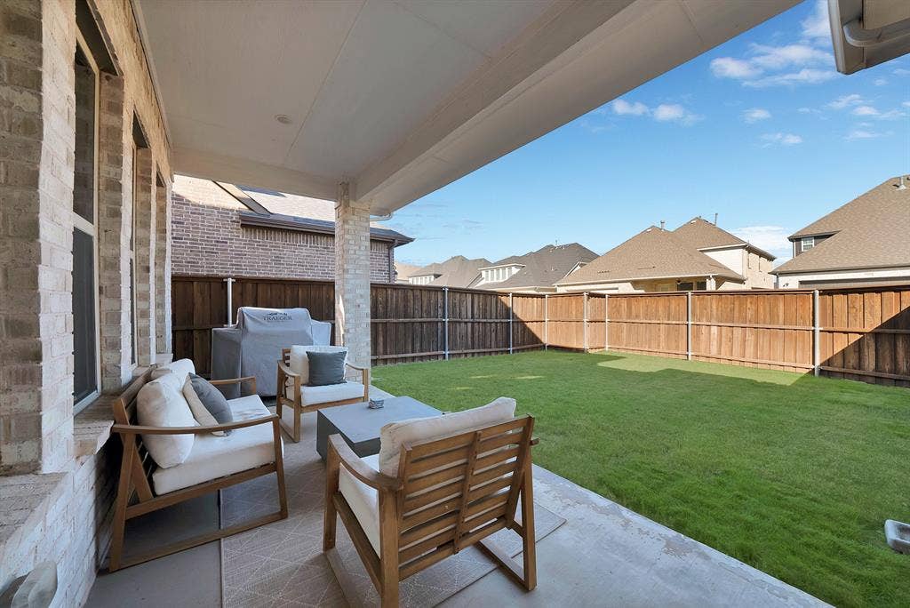 1837 Averi Lane, Farmers Branch, TX 75234 Covered patio featuring a concrete slab and overhead lighting