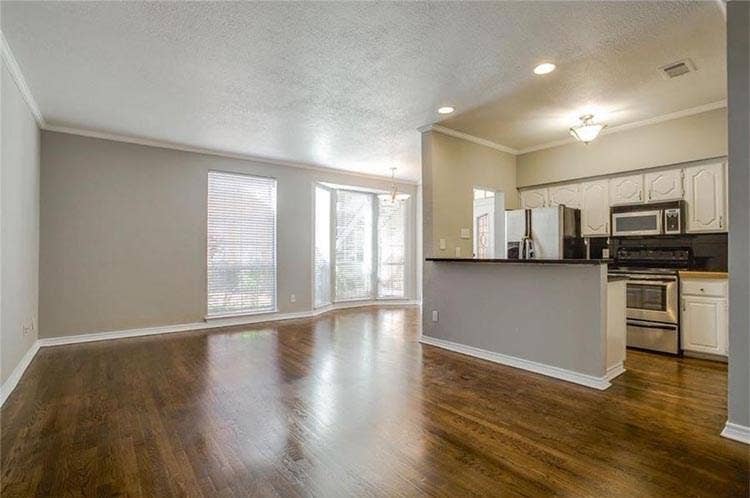 Kitchen and Living Area, Large bay window in dining area.