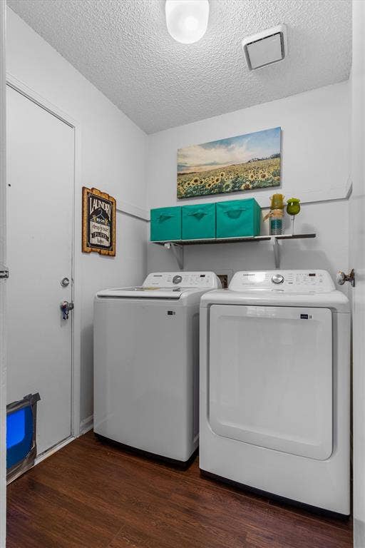 Wood-finish flooring with a side-by-side washer and dryer set