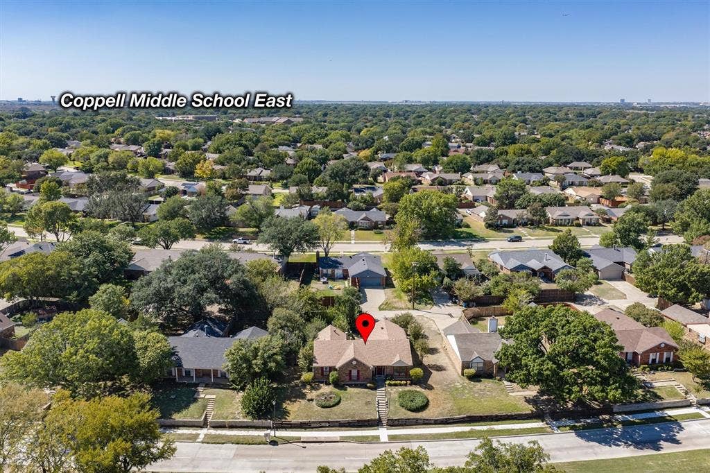 Neighborhood overview with a prominent school in the vicinity