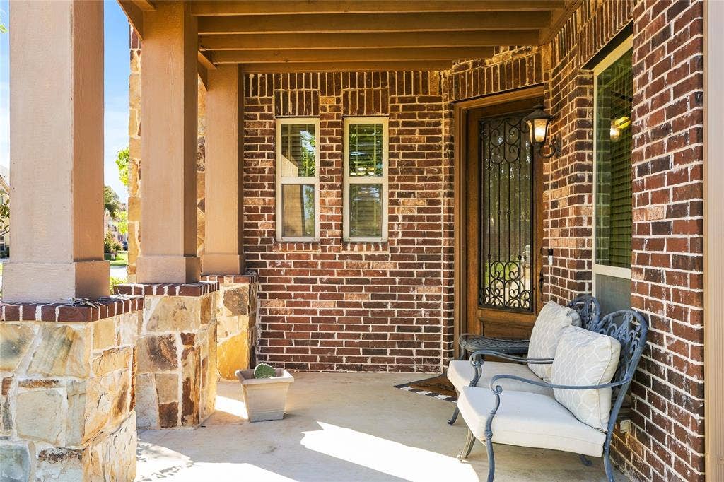 2820 Mariposa Drive, Grand Prairie, TX 75054 Welcoming covered front porch with room to relax and unwind.