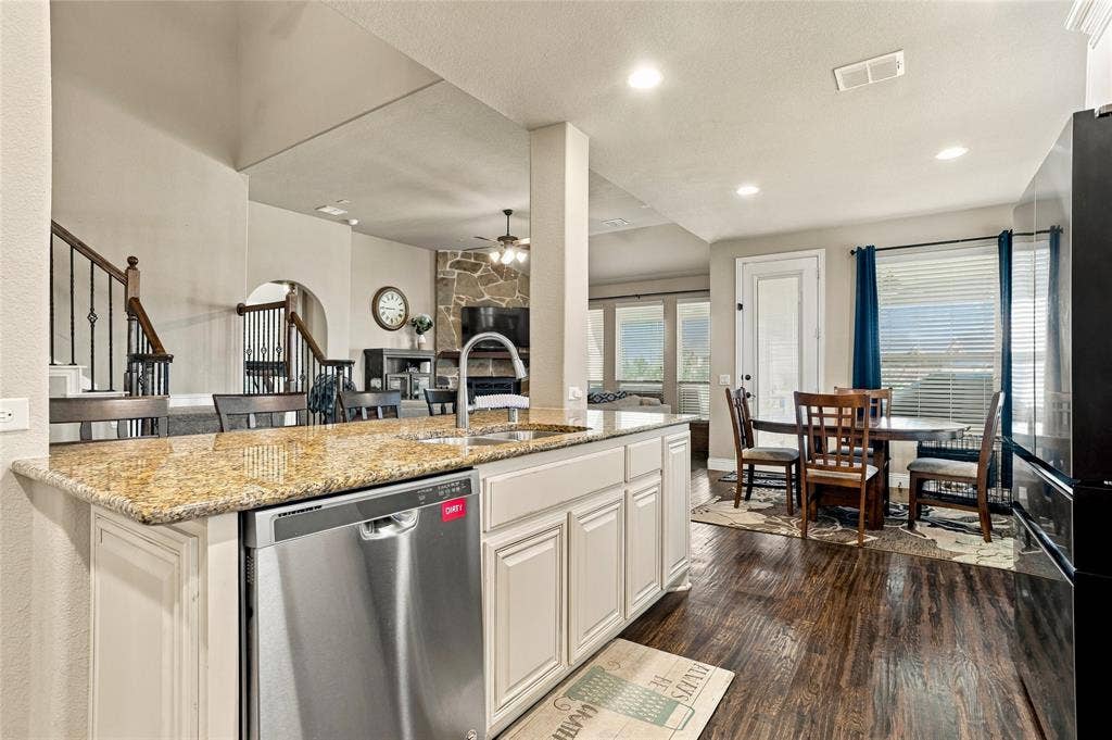 2820 Mariposa Drive, Grand Prairie, TX 75054 Open kitchen layout offering functionality and room to gather.