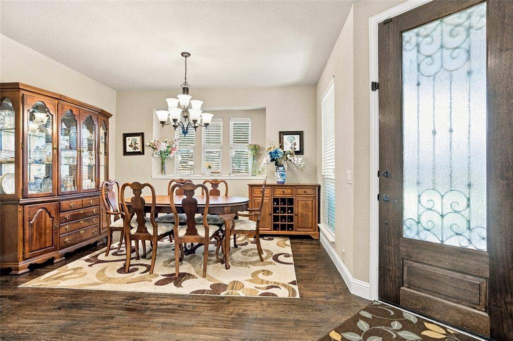 2820 Mariposa Drive, Grand Prairie, TX 75054 Elegant formal dining area with beautiful natural light.