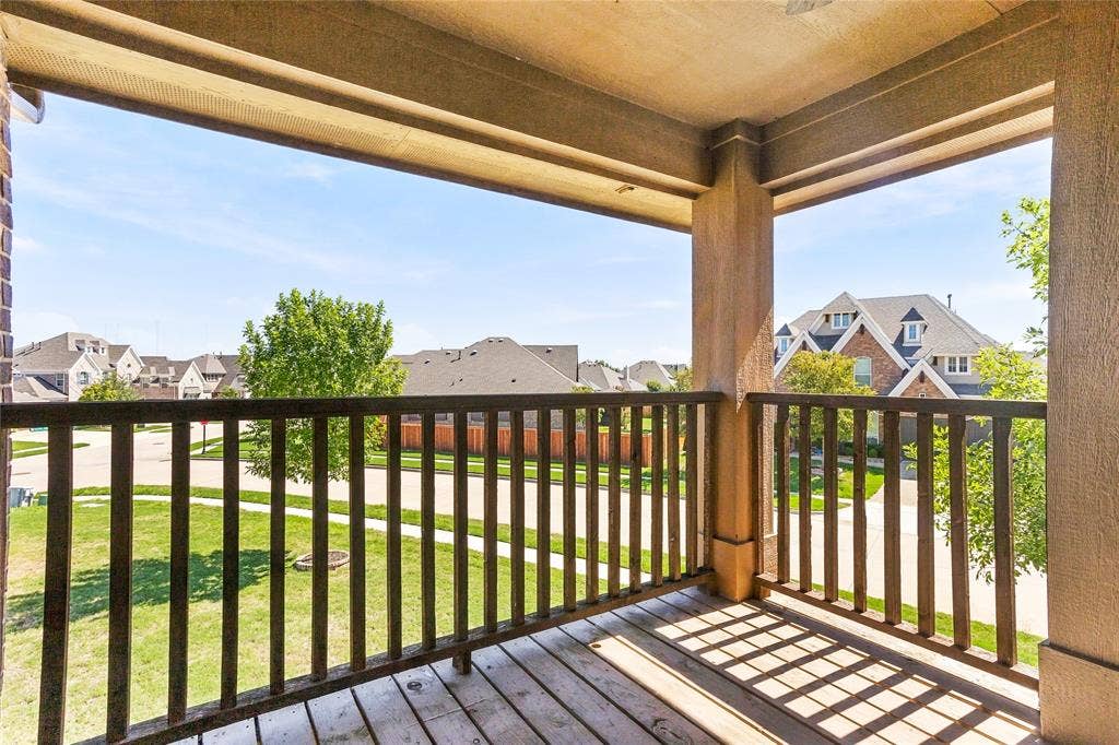 2820 Mariposa Drive, Grand Prairie, TX 75054 Covered balcony offering a peaceful outdoor retreat.