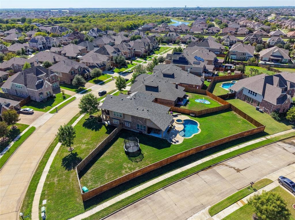 2820 Mariposa Drive, Grand Prairie, TX 75054 Overhead aerial showcasing the property's lot and backyard layout.