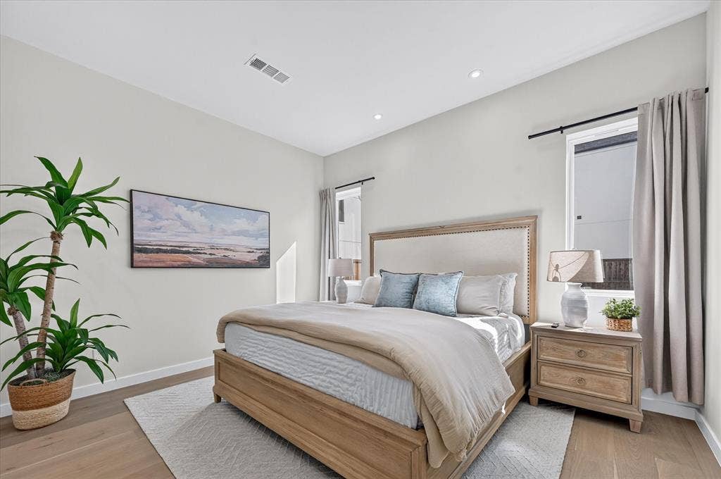 835 Nomas Street, Dallas, TX 75212 Recessed lighting, light wood-finish flooring, high ceilings, and windows with curtain rods