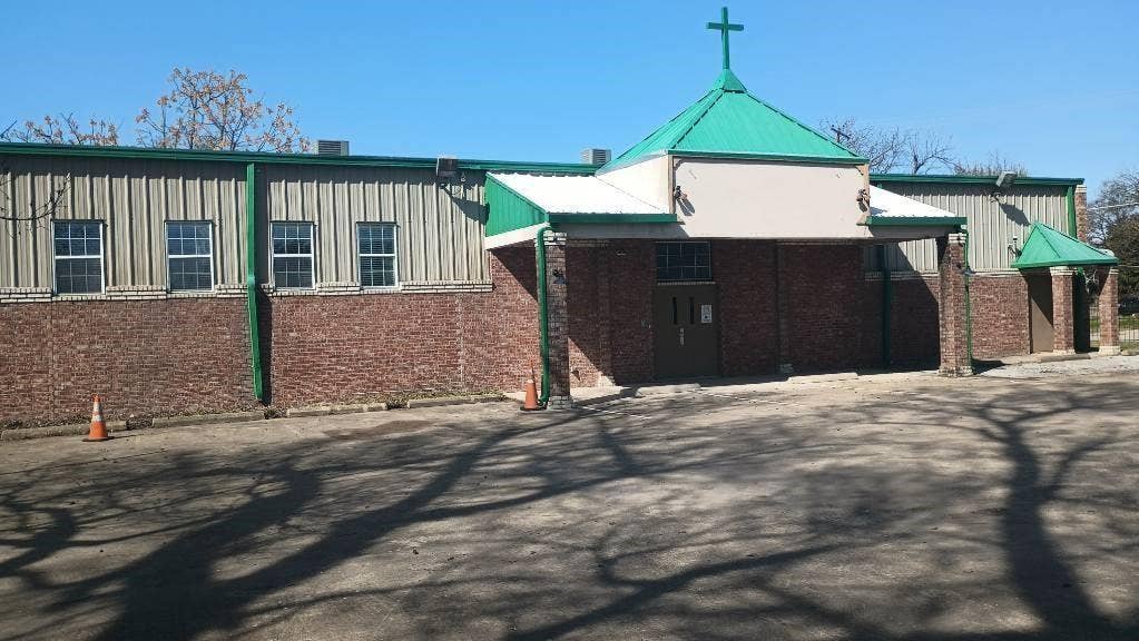 5001 Crozier Street, Dallas, TX 75215 Brick and metal siding exterior with multiple windows