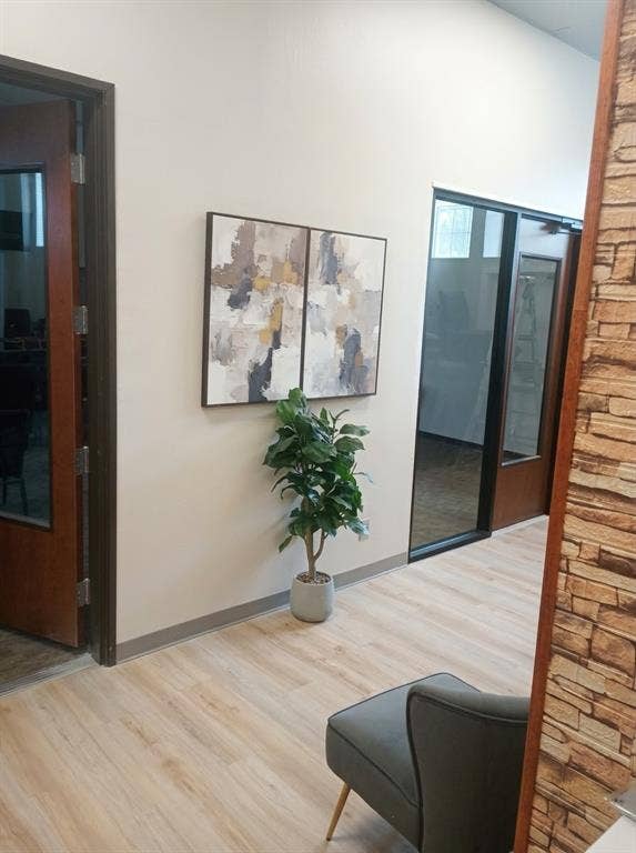 5001 Crozier Street, Dallas, TX 75215 Wood-finish flooring throughout, bright white walls, and a modern trim package