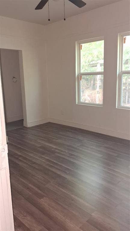 1224 Frost Avenue, Waco, TX 76708 Wood-finish flooring, white walls, two windows, and a ceiling fan
