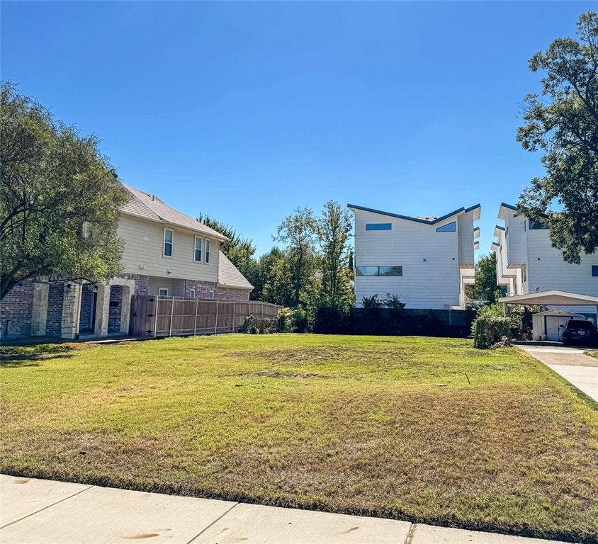 5946 Lewis Street, Dallas, TX 75206 Expansive grassy lot with a flat topography