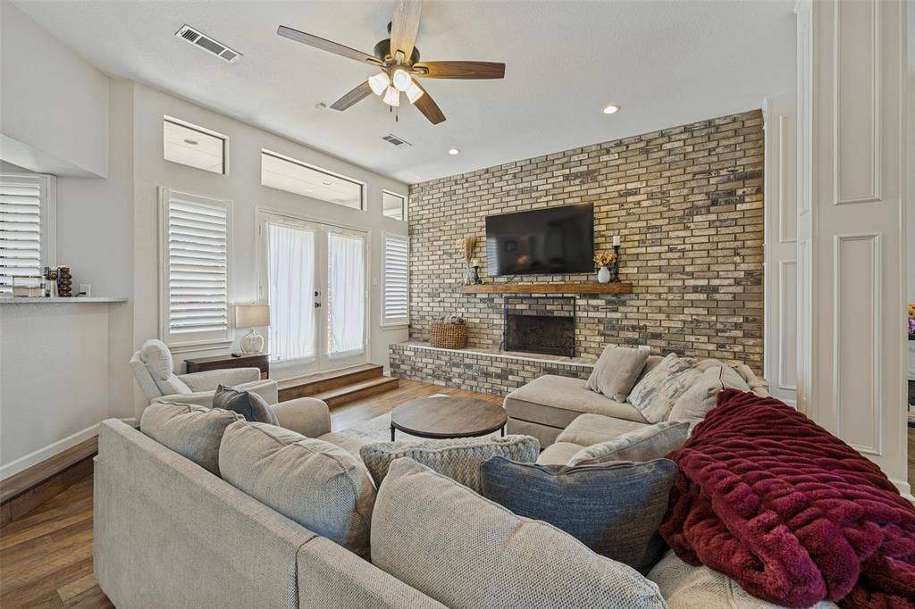 Living Room with Brick Fireplace