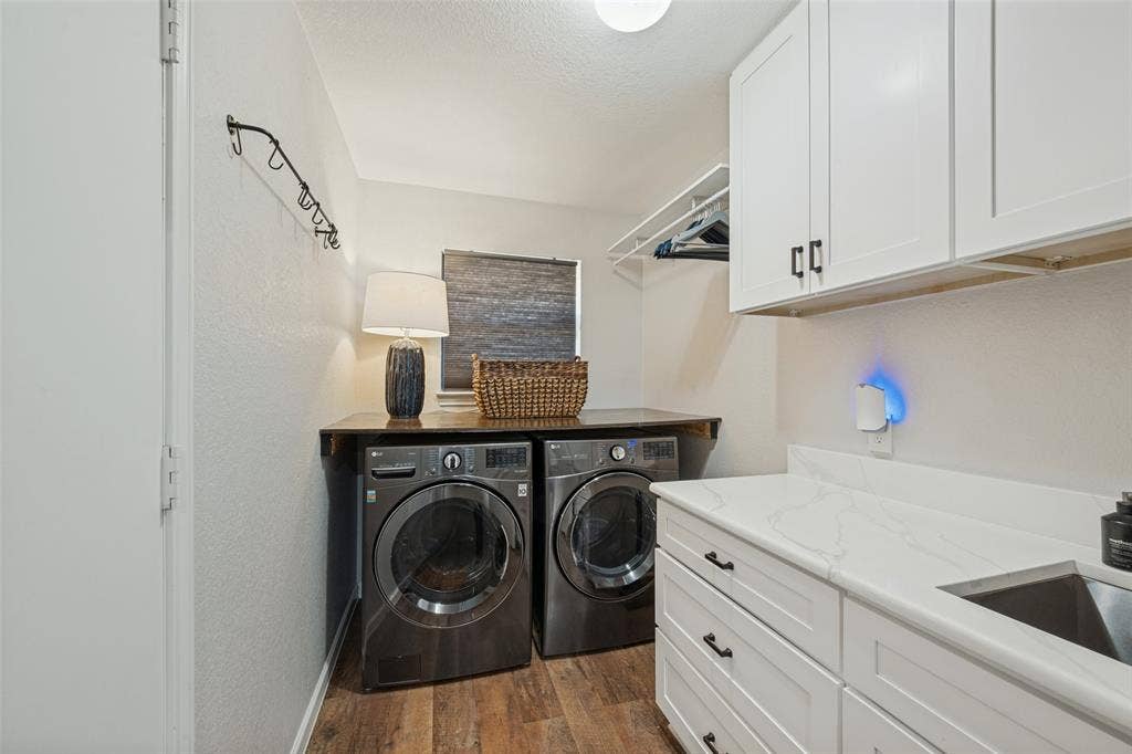 Awesome Laundry Room with Built-in Cabinets, Sink, and Floding TAble