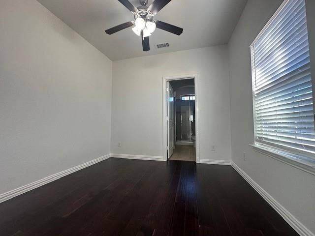 901 Brookville Court, Plano, TX 75074 Wood-finish flooring, ceiling fan, window with blinds, and white trim throughout