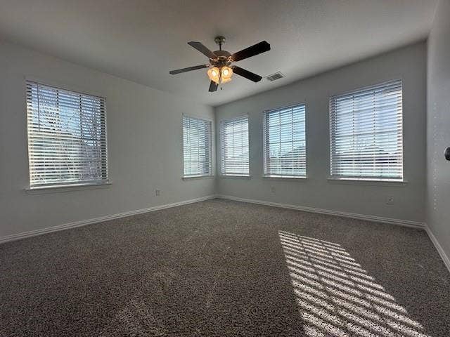 901 Brookville Court, Plano, TX 75074 Plush carpeted flooring, multiple large windows with blinds, recessed lighting, and a ceiling fan with integrated lighting