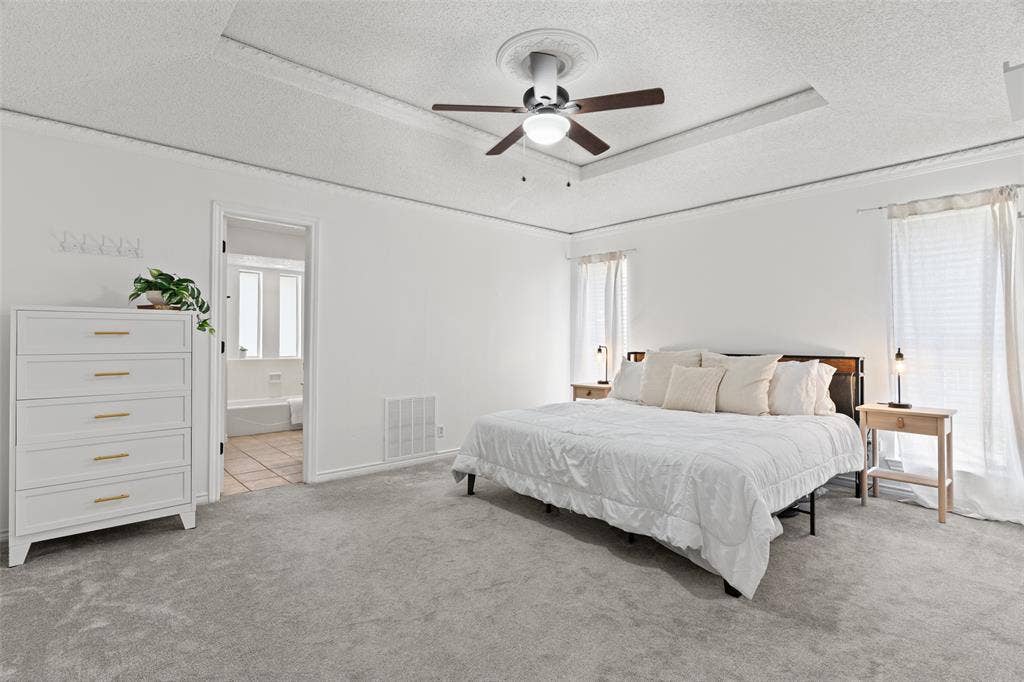 841 Villa Ridge Drive, Garland, TX 75043 Recessed ceiling with an overhead fan, dual windows, and carpeted flooring