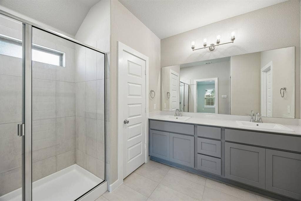 Primary Bathroom in the Emmy II home plan - REPRESENTATIVE PHOTO