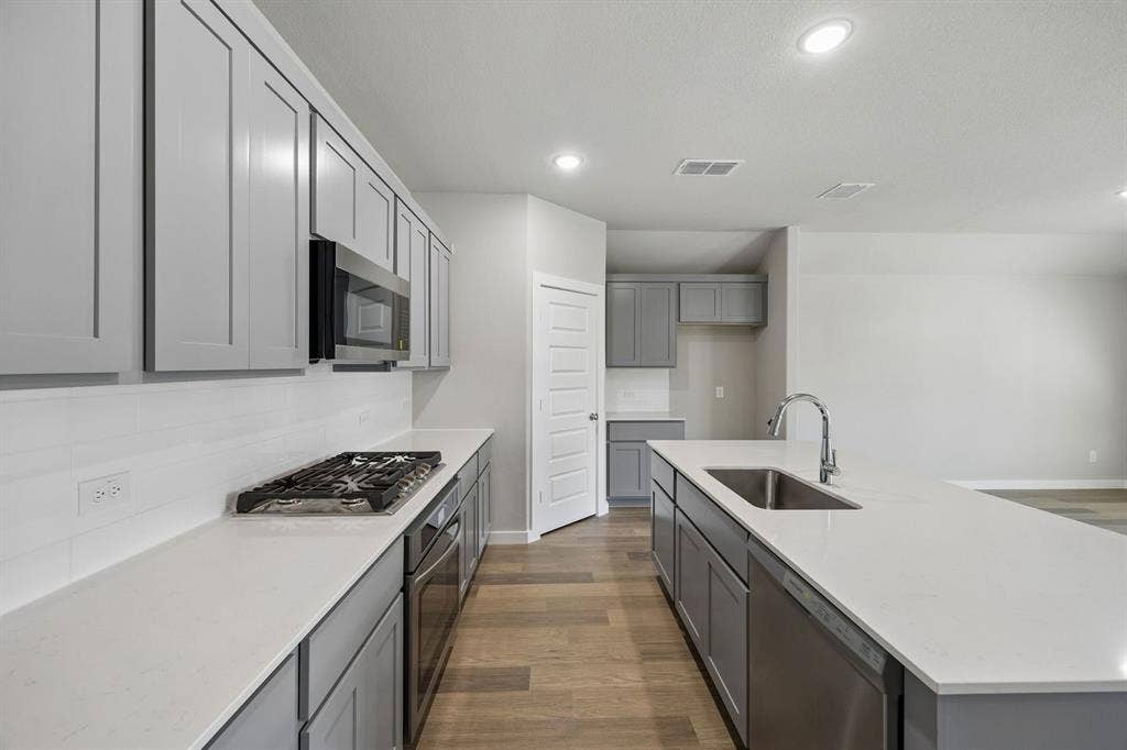 Kitchen in the Emmy II home plan - REPRESENTATIVE PHOTO