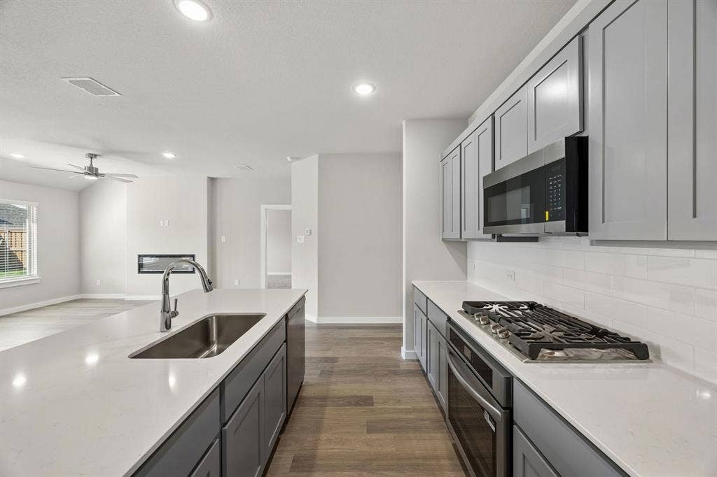 Kitchen in the Emmy II home plan - REPRESENTATIVE PHOTO