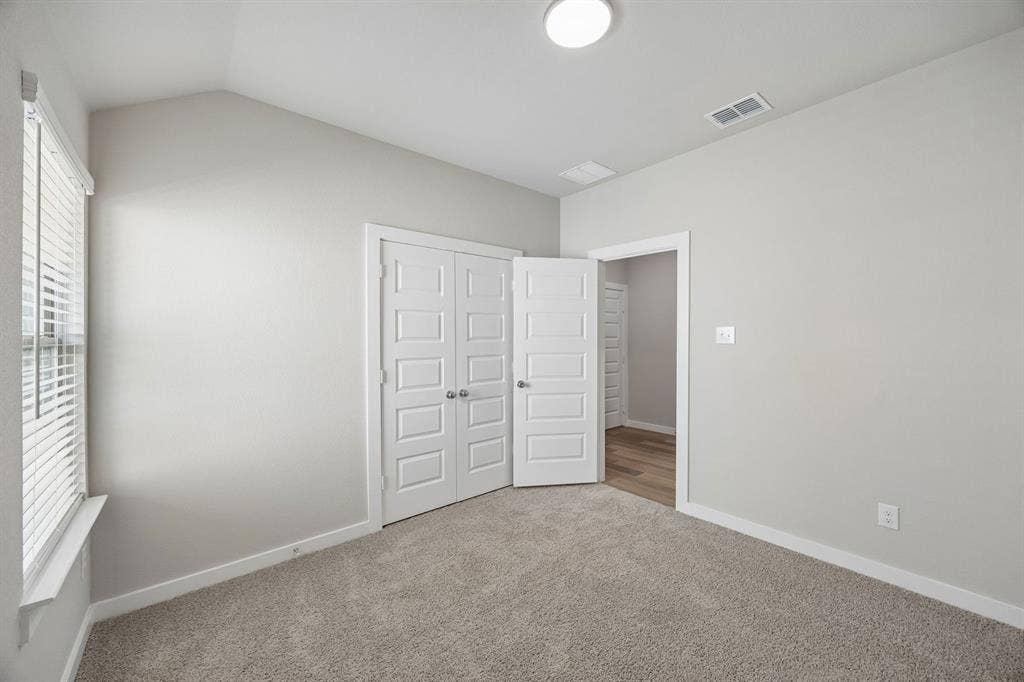 Bedroom in the Emmy II home plan - REPRESENTATIVE PHOTO