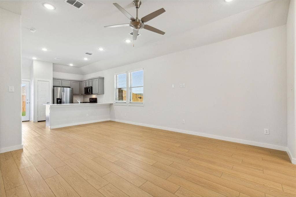 115 Longhorn Lane, Lavon, TX 75166 Living Room in the Ash home plan – REPRESENTATIVE PHOTO