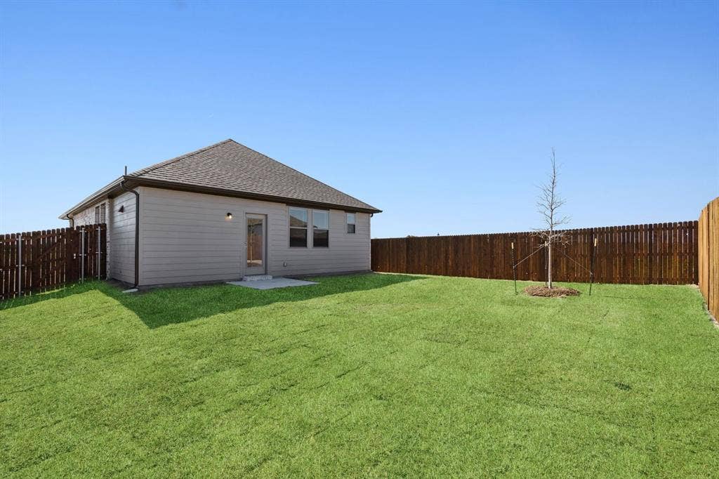 115 Longhorn Lane, Lavon, TX 75166 Back Yard in the Ash home plan – REPRESENTATIVE PHOTO