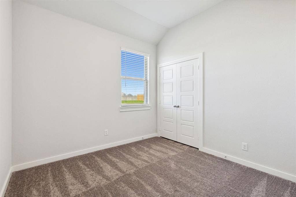 115 Longhorn Lane, Lavon, TX 75166 Bedroom in the Ash home plan – REPRESENTATIVE PHOTO