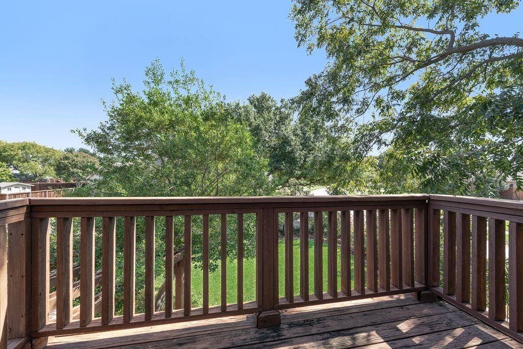Upstairs balcony with deck.