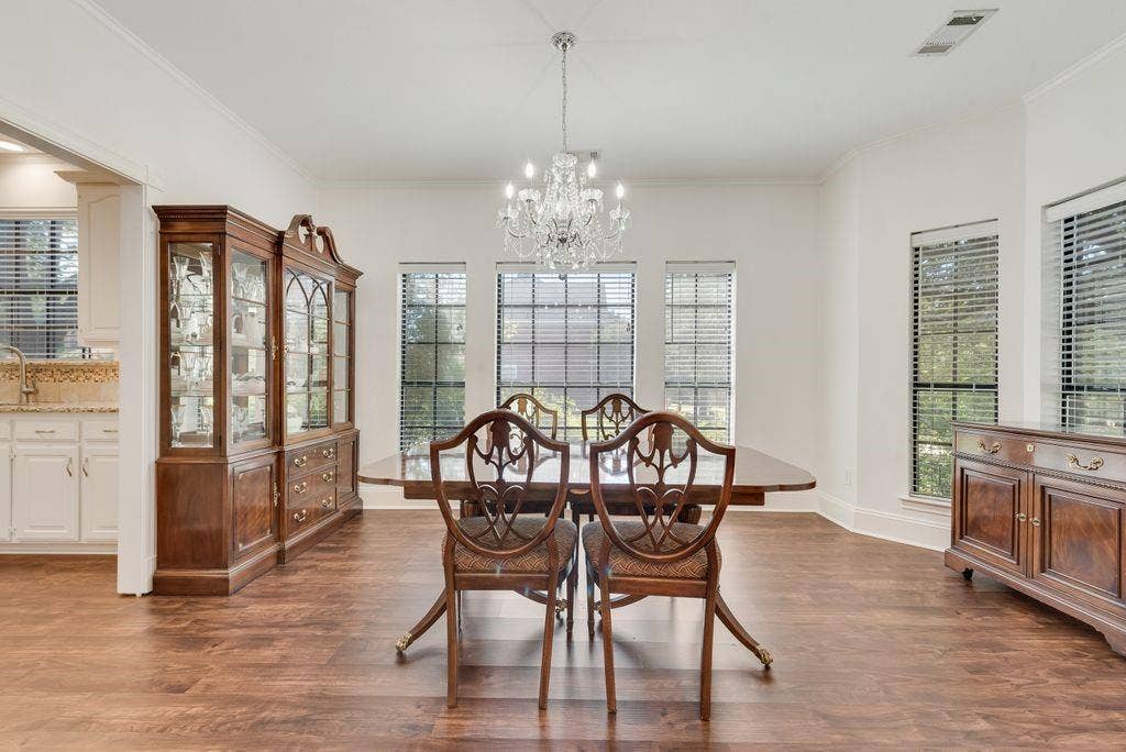 Spacious formals, soaring ceilings and appealing windows.