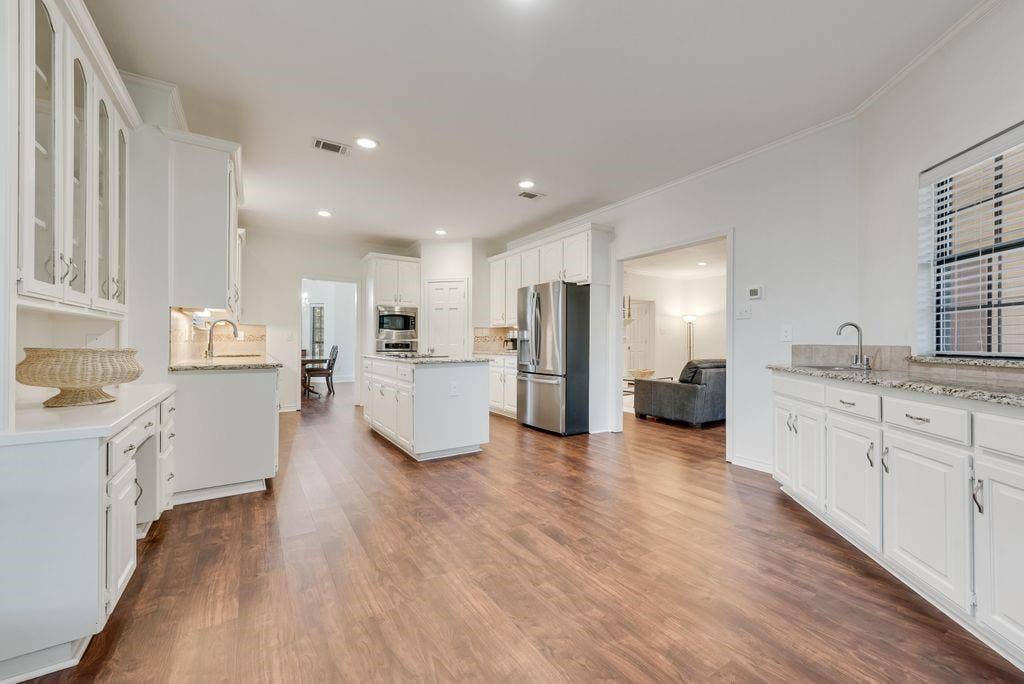 Stunning breakfast area with built in buffet and separate sink.