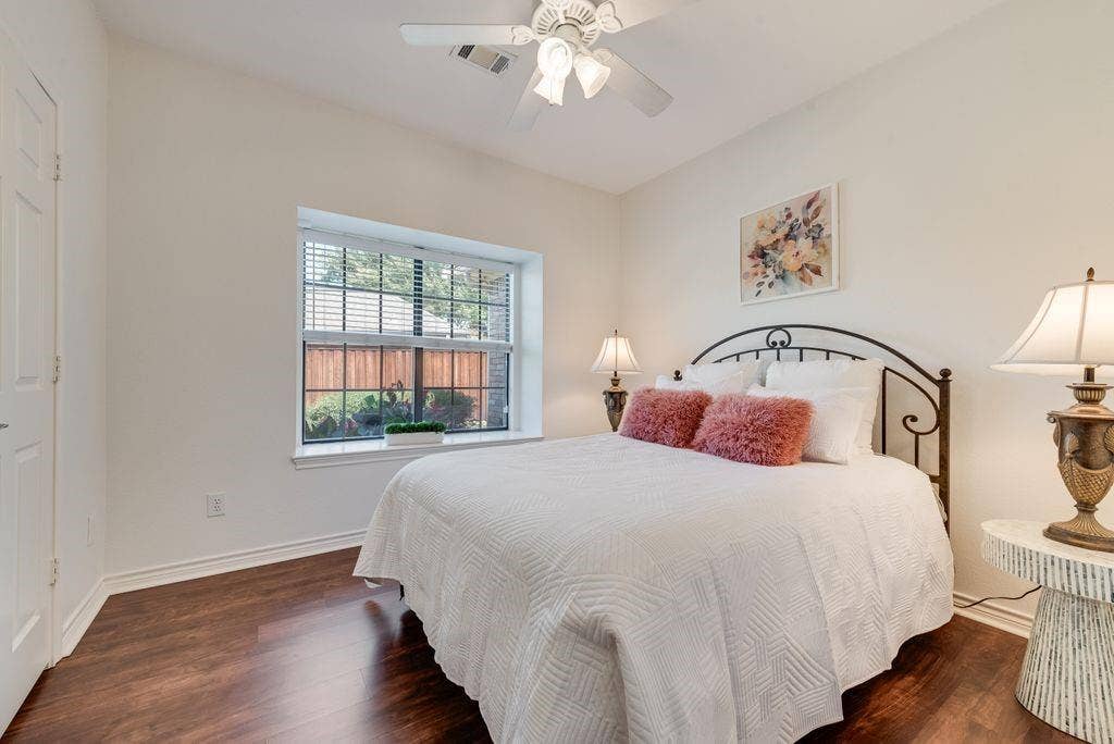 Guest bedroom on first floor with adjacent full bath.