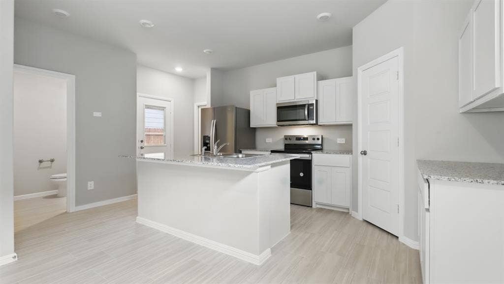 Kitchen - All Home and community information, including pricing, included features, terms, availability and amenities, are subject to change at any time without notice or obligation. All Drawings, pictures, photographs, video, square footages, floor plans, elevations, features, colors and sizes are approximate for illustration purposes only and will vary from the homes as built.