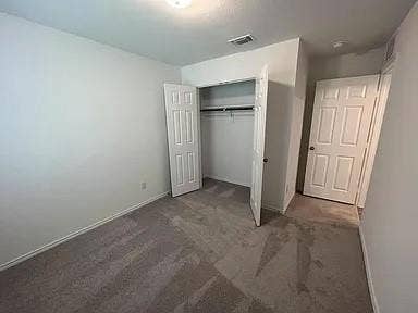 610 Grenada Lake Drive, Princeton, TX 75407 Neutral-toned carpeting throughout