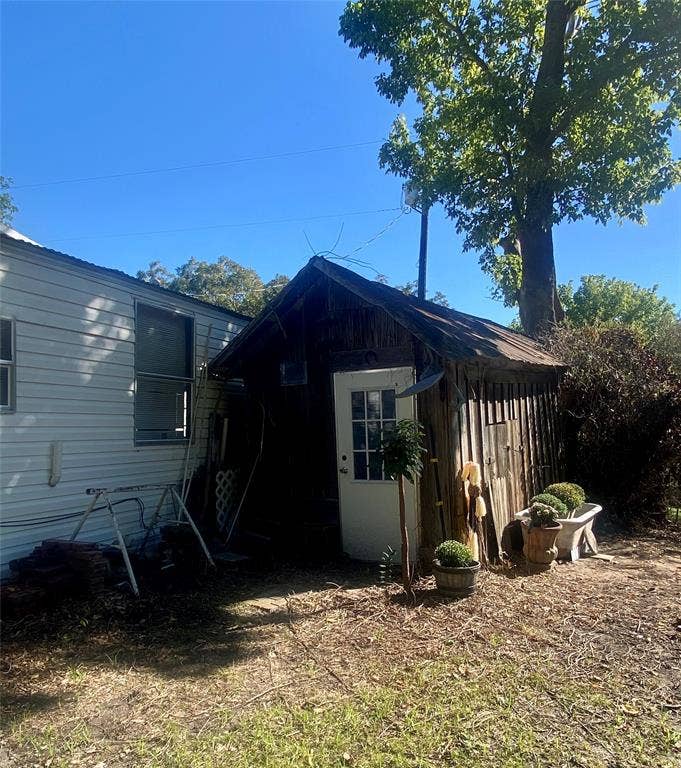 Storage building by garage/workshop entrance