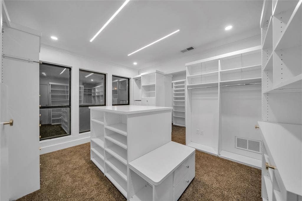 7001 Rocky Top Circle, Dallas, TX 75252 Spacious closet with dark carpet