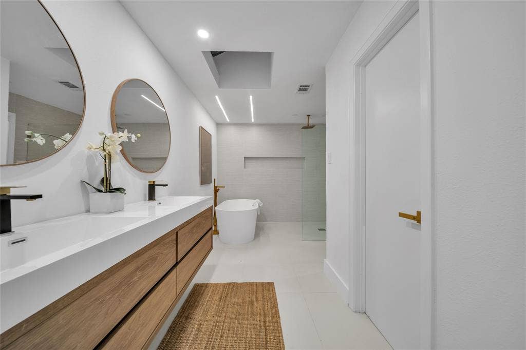 7001 Rocky Top Circle, Dallas, TX 75252 Bathroom featuring tile patterned floors, vanity, and shower with separate bathtub