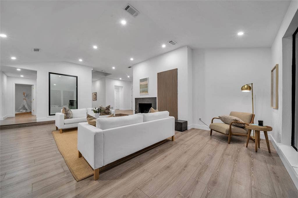 7001 Rocky Top Circle, Dallas, TX 75252 Living room featuring light wood-type flooring