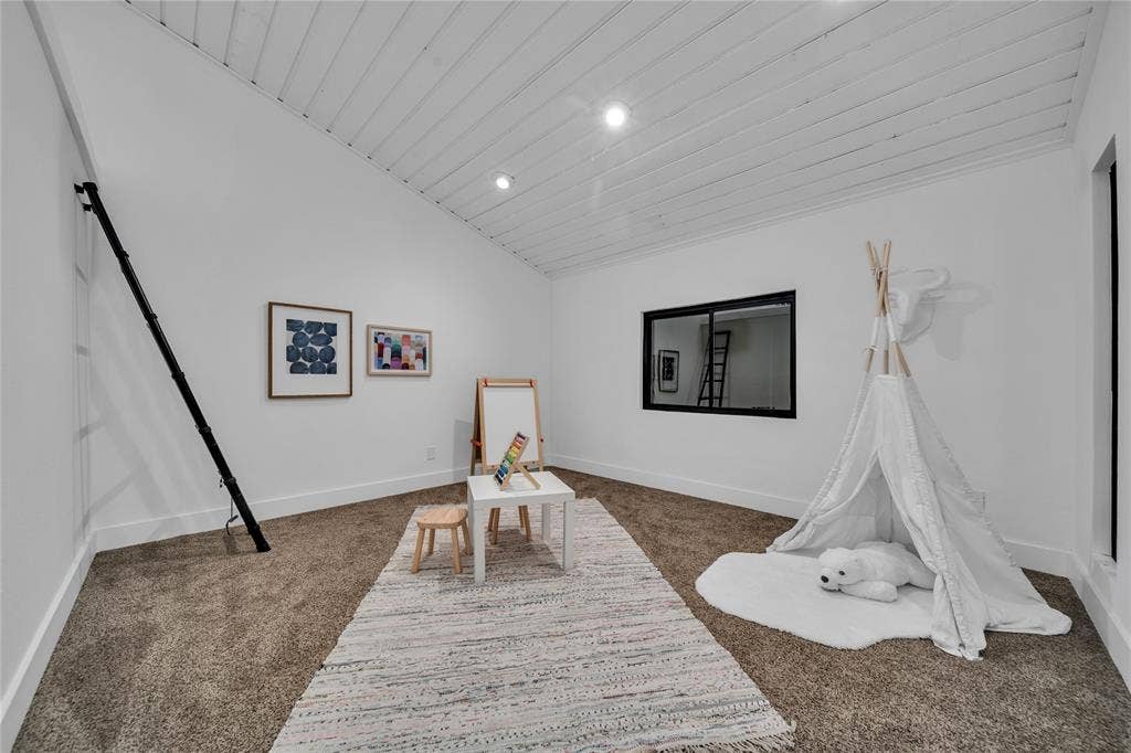 7001 Rocky Top Circle, Dallas, TX 75252 Playroom featuring wooden ceiling, dark carpet, and lofted ceiling