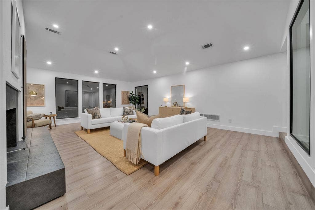7001 Rocky Top Circle, Dallas, TX 75252 Living room featuring light hardwood / wood-style flooring