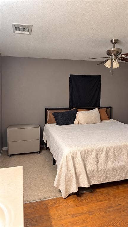 1017 W 3rd Street, Taylor, TX 76574 Spacious bedroom with ample floor space for complete bedroom furniture sets.