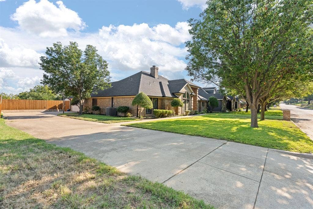 Long driveway to oversize garage