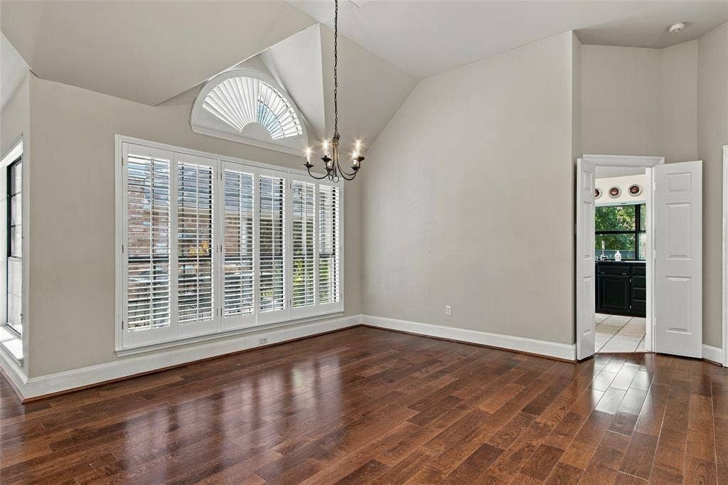 Spacious dining room with more windows and plantation shutters!