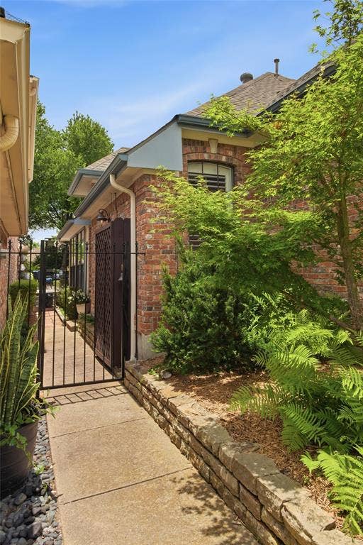 Private side entrance - with metal gate.