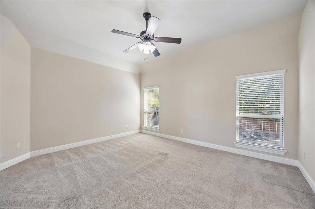 901 Memory Lane, McKinney, TX 75072 Spacious primary bedroom at the back of the home.