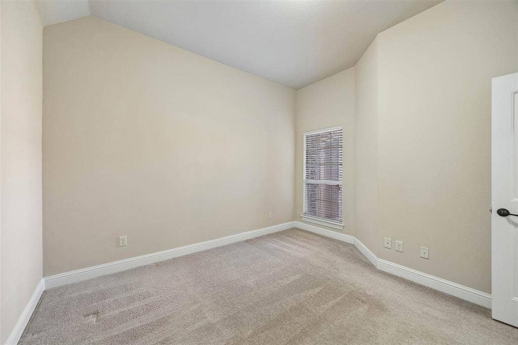 901 Memory Lane, McKinney, TX 75072 Secondary bedroom with carpet and walk in closet